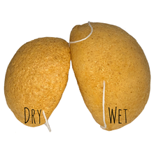 Load image into Gallery viewer, 2 yellow konjac sponges, one wet and one dry to show the difference
