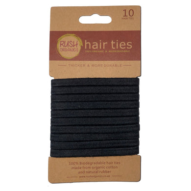 10 x plastic free organic and biodegradable hair ties on a cardboard holder, made from organic cotton and natural rubber