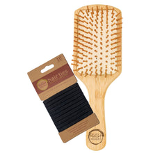 Load image into Gallery viewer, bamboo square paddle hair brush with natural rubber. rush organics logo at the bottom on the handle. 10 x plastic free black hair ties on cardboard holder.