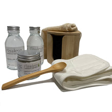 Load image into Gallery viewer, flawless and rush organics ultimate skincare bundle including; micellar water, facial cleanser with bamboo spoon, hydrating toner, reusable black bamboo make up remover pads in bamboo holder with mesh laundry bag and bamboo cotton make up headband