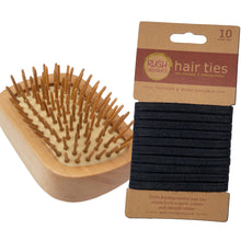 Load image into Gallery viewer, bamboo detangling hair brush tangle teaser with natural rubber. rush organics logo at the bottom on the handle. 10 x plastic free black hair ties on cardboard holder.