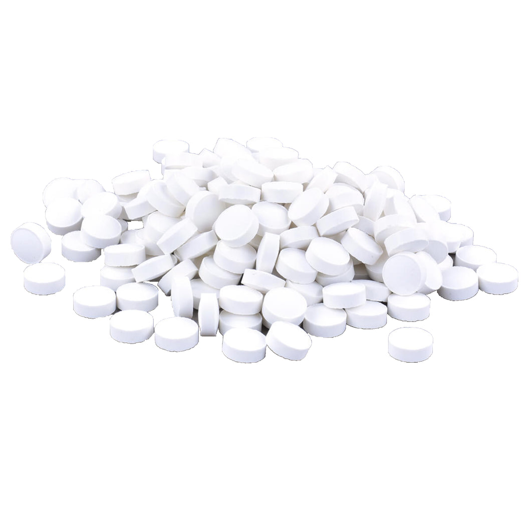 pile of loose white toothpaste tablets 
