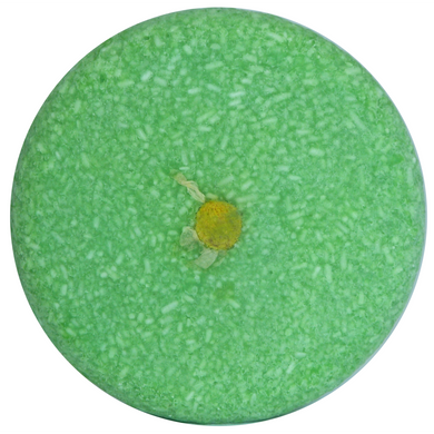 green chamomile and peppermint solid shampoo bar with chamomile petal in the centre