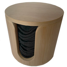 Load image into Gallery viewer, Bamboo cylinder with hole in the front to make it easier for taking pads out. black bamboo reusable make up remover pads can be seen. 
