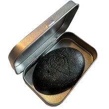 Load image into Gallery viewer, vegan black beauty conditioner bar in a slimline conditioner bar tin. suitable for all hair types. activated charcoal, black pepper and blueberry. 
