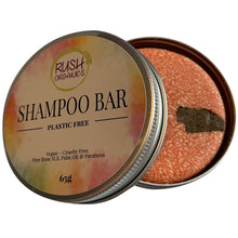 Load image into Gallery viewer, red cinnamon shampoo bar with cinnamon wood stick in the centre of the bar in a shampoo bar tin

