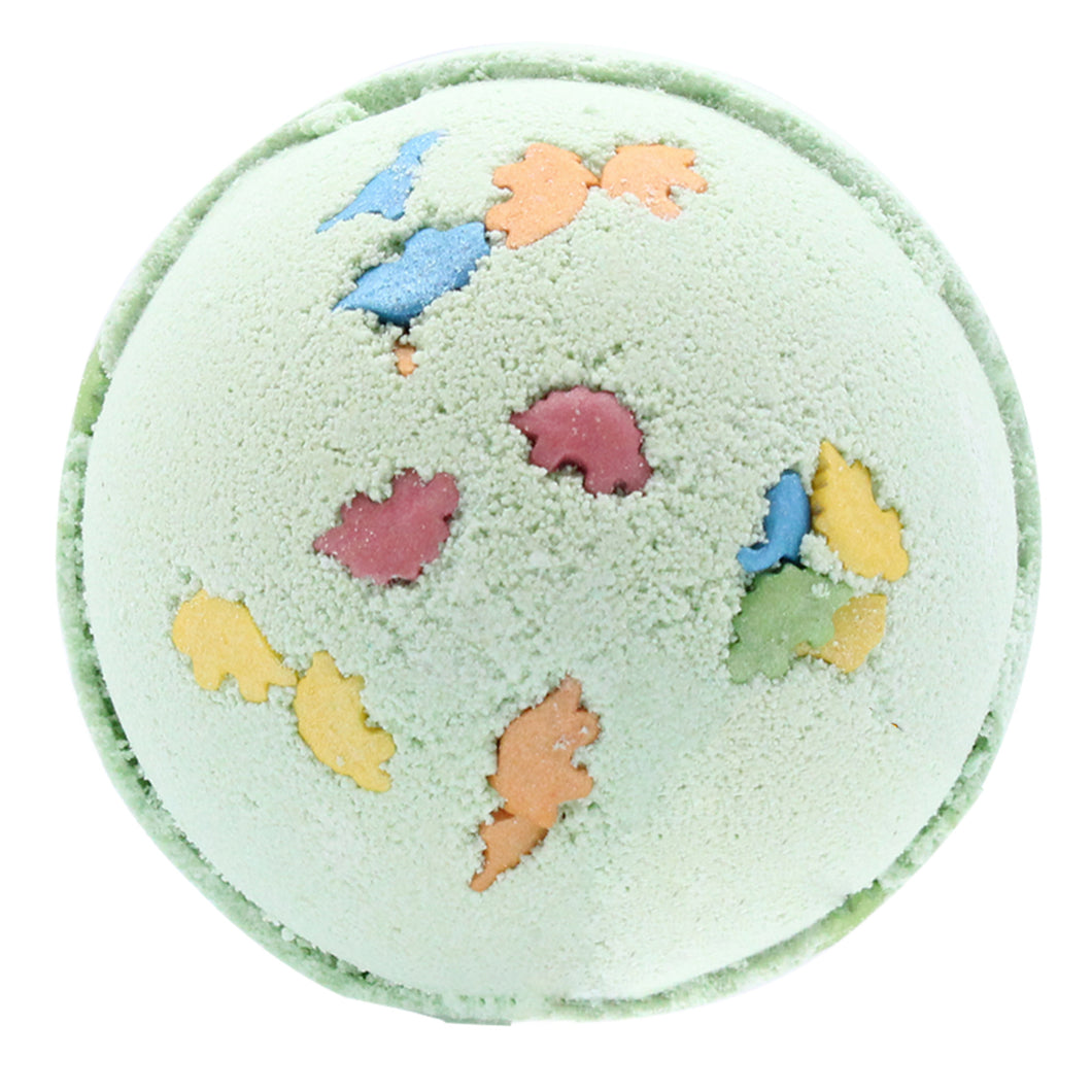 green jumbo bath bomb with orange, blue, yellow and green mini dinosaurs. for kids