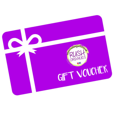 purple gift card with white ribbon, rush organics logo and gift voucher written on it.