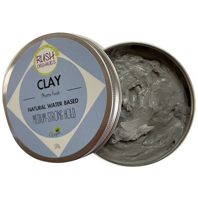 Aluminium tin of grey organic and vegan hair clay for a medium-strong hold and matte finish
