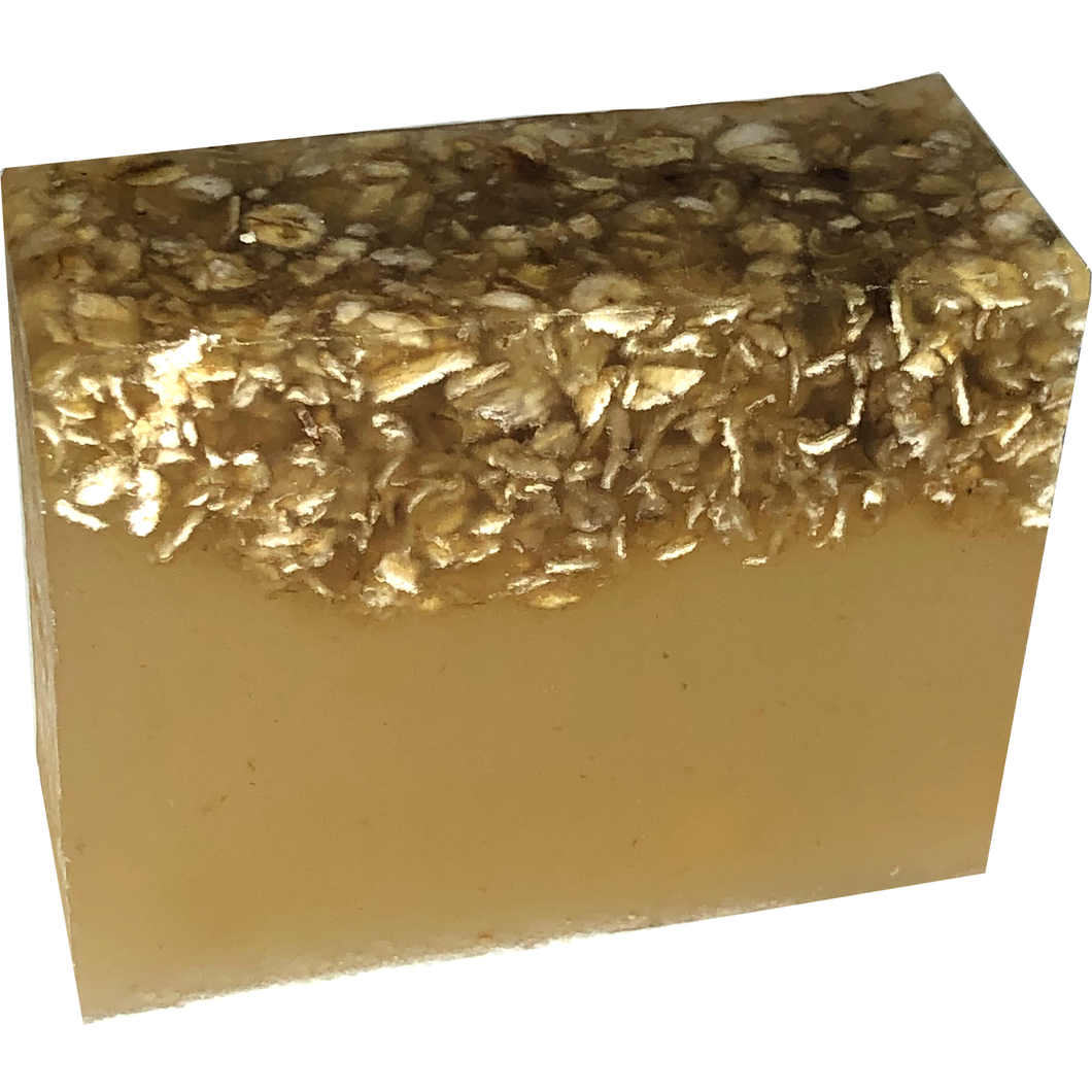 yellow honey coloured agave honey and oat organic vegan soap bar with layer of oats on top