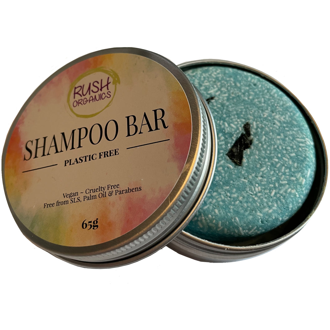 plastic free organic vegan nori nori seaweed solid shampoo bar with seaweed in the middle of the bar in shampoo bar tin