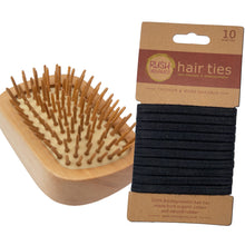 Load image into Gallery viewer, bamboo detangling hair brush tangle teaser with natural rubber. rush organics logo at the bottom on the handle. 10 x plastic free black hair ties on cardboard holder.
